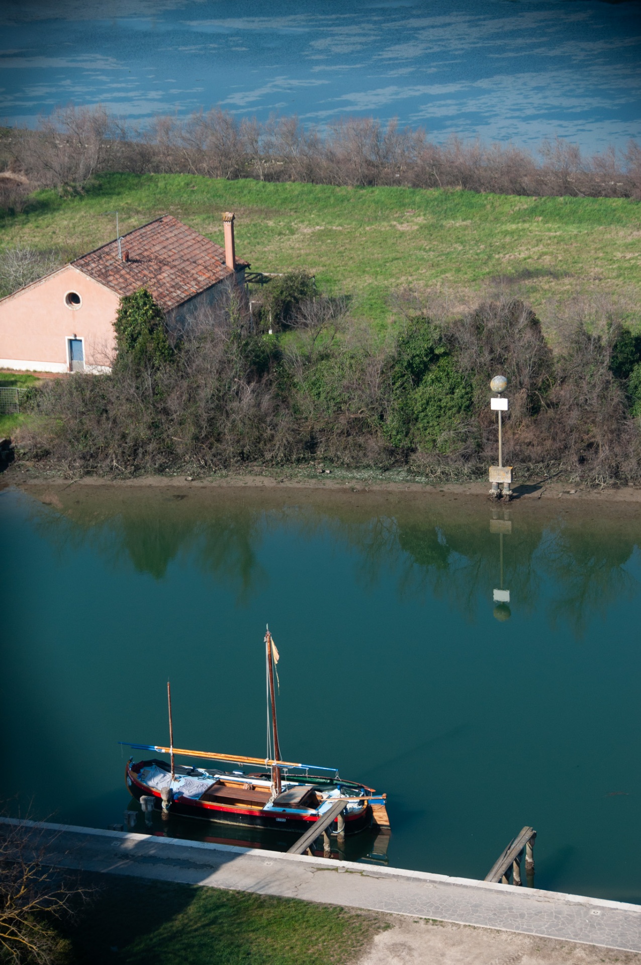 Colorful houses of Burano reflected in the canal