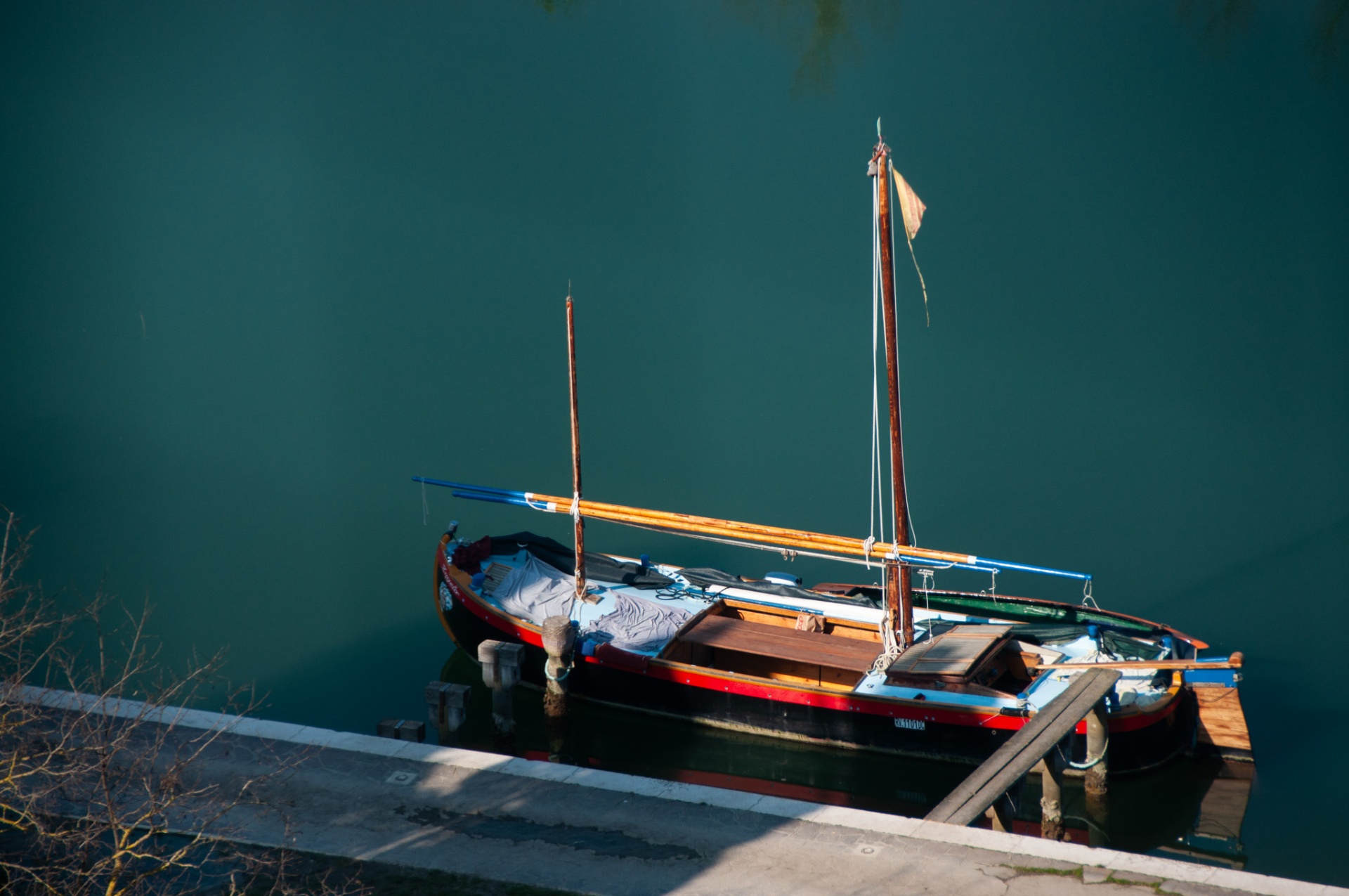 Couple on a Venetian boat at sunset